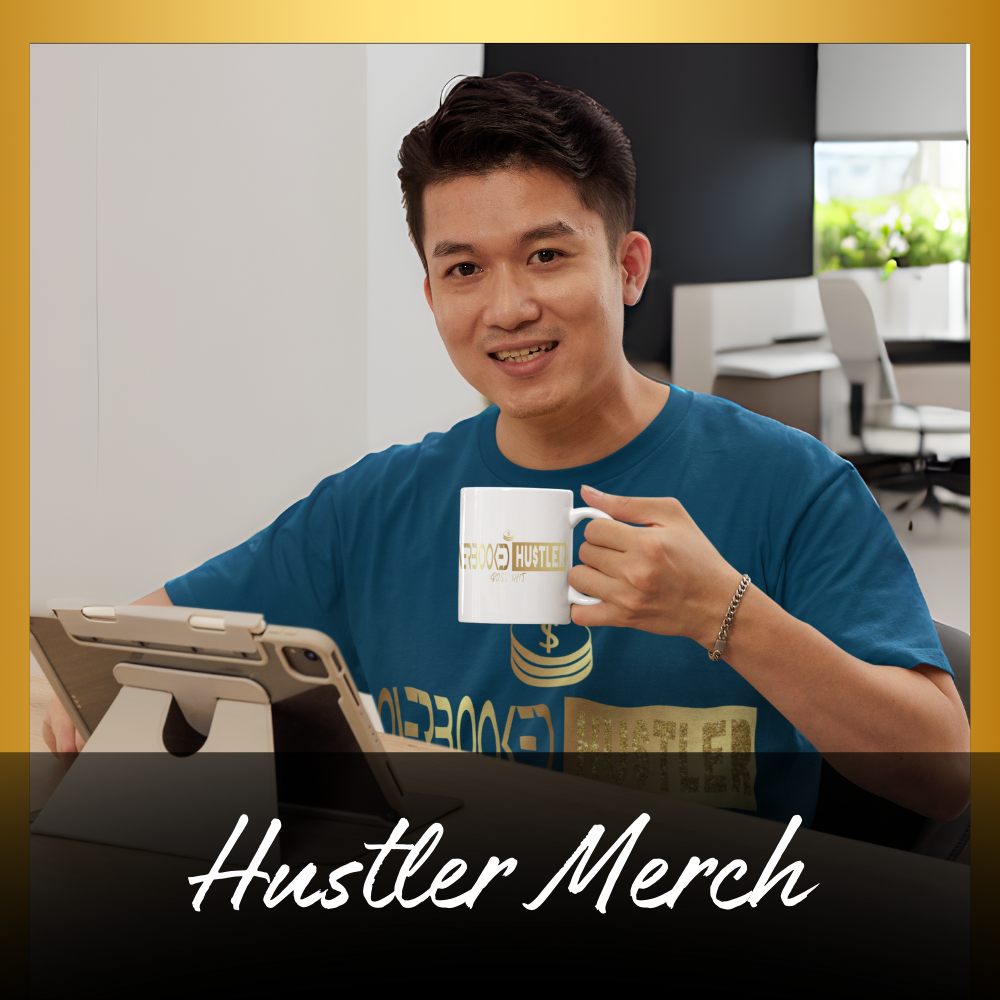 A man at a desk wearing an Overbooked Hustler t-shirt and holding a coffee mug with the logo, embodying the hustle lifestyle.